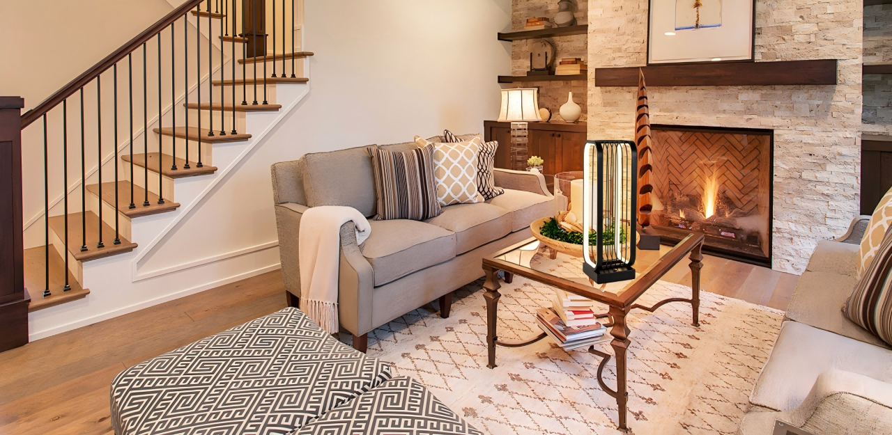 Uniquely shaped, a cylindrical lamp on the table adds warmth and elegance to the living room.
